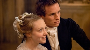 Cosette (Amanda Seyfried) and Marius (Eddie Redmayne) fall in love in a world shaken by revolution.