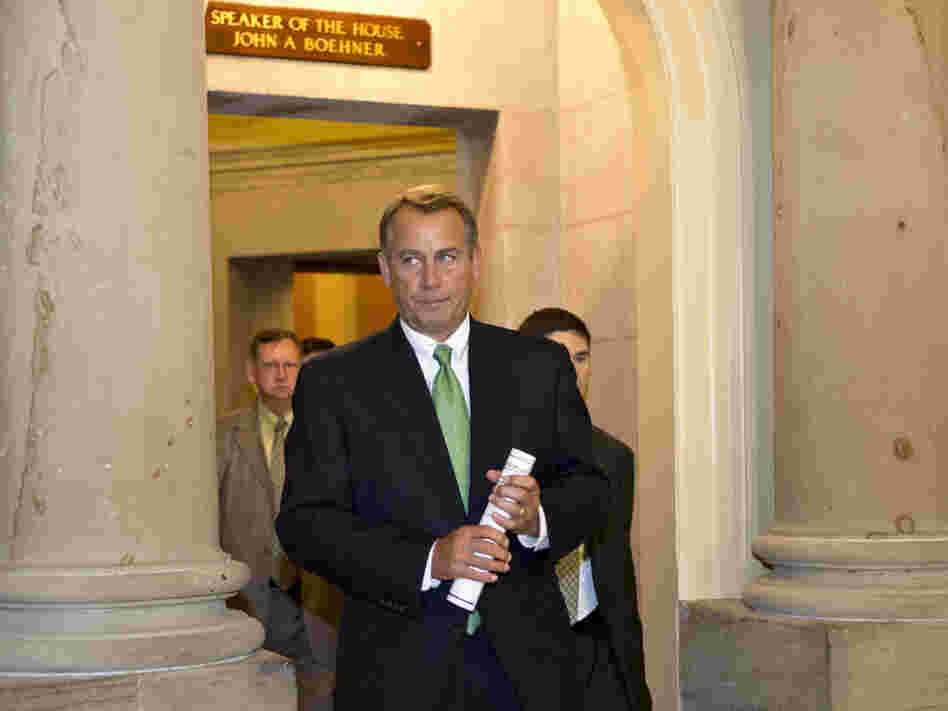 Speaker John Boehner leaves his office Tuesday and walks to the House floor to deliver remarks about negotiations with President Obama on the fiscal cliff. Speaker John Boehner leaves his office Tuesday and walks to the House floor to deliver remarks about negotiations with President Obama on the fiscal cliff.