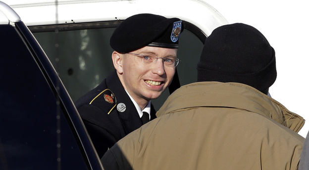 Army Pfc. Bradley Manning is escorted into the courthouse on Nov. 28.