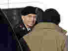Army Pfc. Bradley Manning is escorted into the courthouse on Nov. 28.