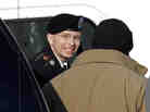 Army Pfc. Bradley Manning is escorted into the courthouse on Nov. 28.