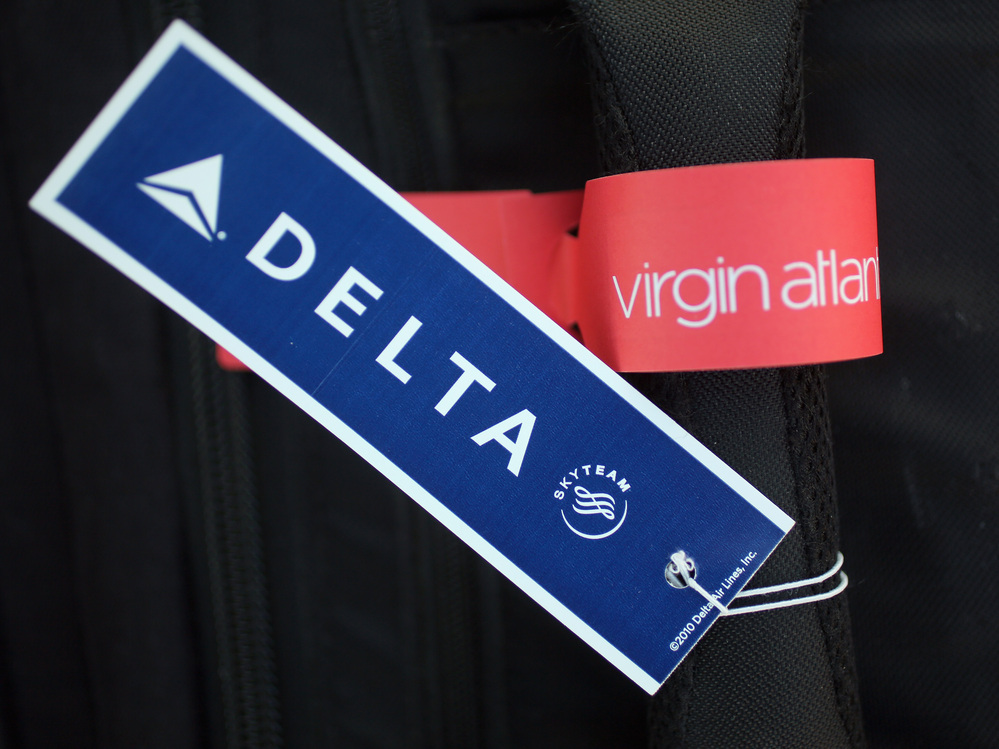 Two bag tags that may soon be together a lot. Two bag tags that may soon be together a lot.