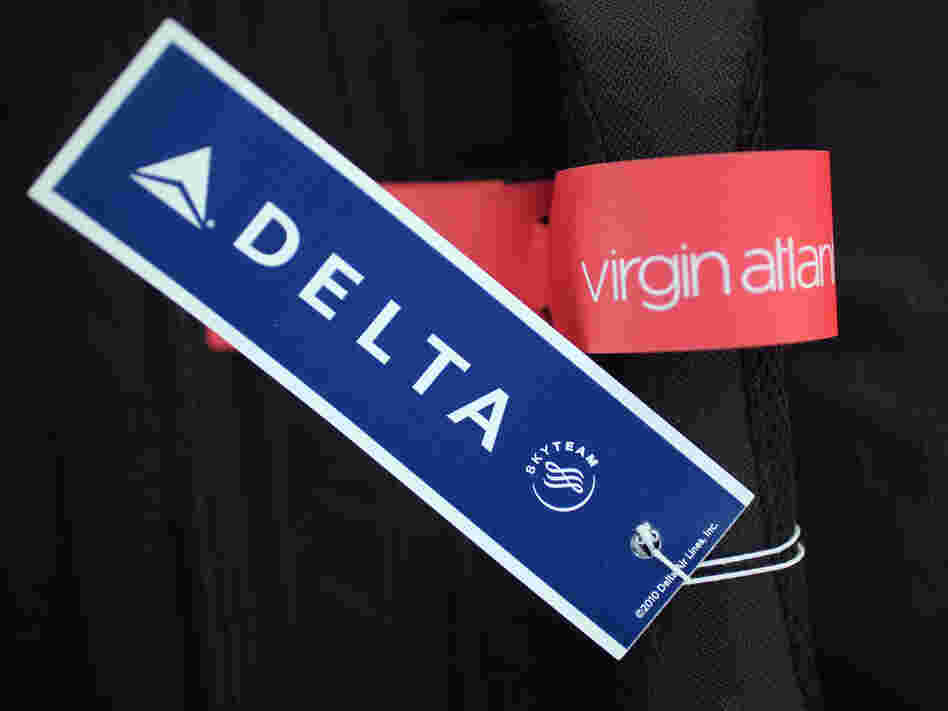 Two bag tags that may soon be together a lot. Two bag tags that may soon be together a lot.