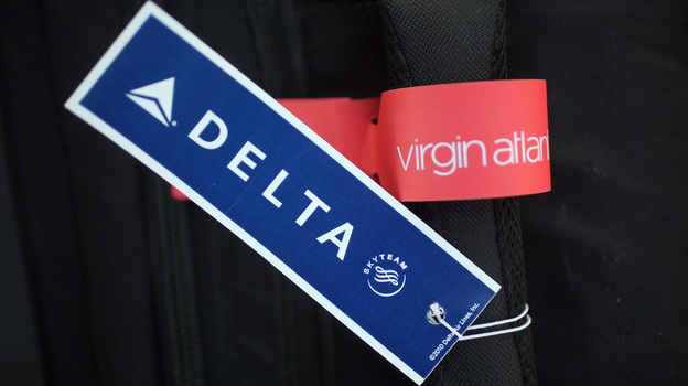 Two bag tags that may soon be together a lot. (Getty Images)