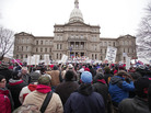 Union members from around the country rallied outside the Michigan State Capitol in Lansing as lawmakers voted on the right-to-work legislation. Union members from around the country rallied outside the Michigan State Capitol in Lansing as lawmakers voted on the right-to-work legislation.