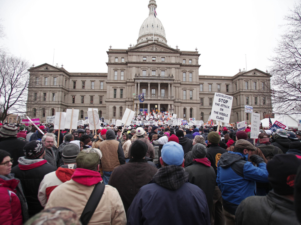 Union members from around the country rallied outside the  Michigan State Capitol in Lansing as lawmakers voted on the right-to-work legislation.