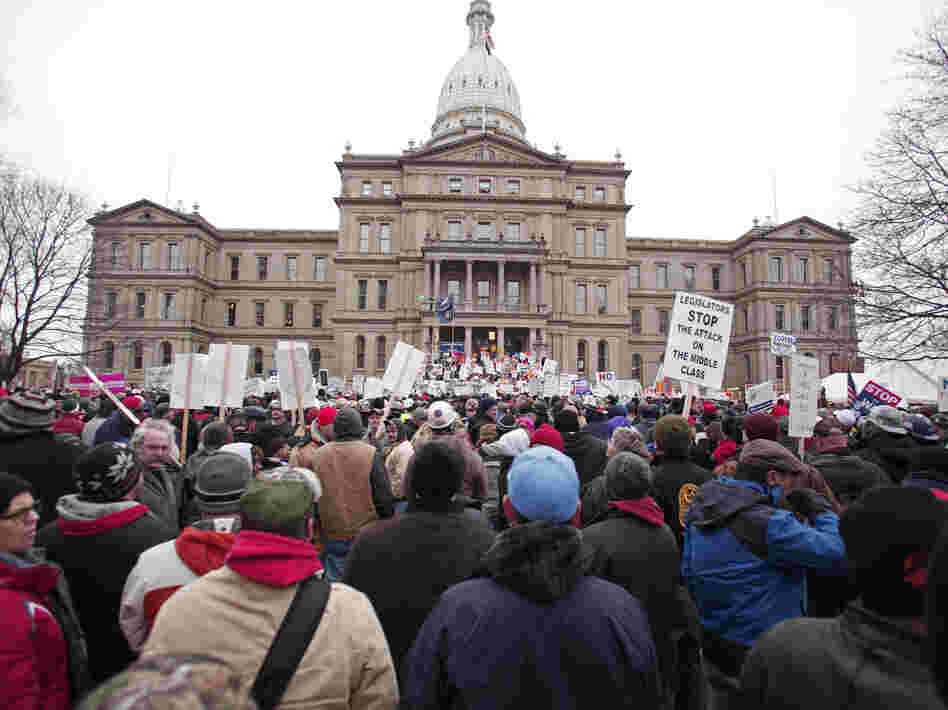 Union members from around the country rallied outside the  Michigan State Capitol in Lansing as lawmakers voted on the right-to-work legislation.