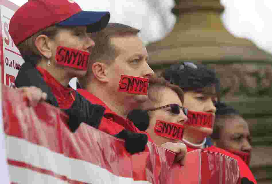 Members of the Michigan Nurses Association state on the Michigan state capitol steps on Dec. 10, 2012, protesting right-to-work legislation backed by lawmakers and Gov. Rick Snyder. Members of the Michigan Nurses Association state on the Michigan state capitol steps on Dec. 10, 2012, protesting right-to-work legislation backed by lawmakers and Gov. Rick Snyder.