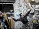 To date, Syrian rebels have had to rely on small-scale weapons in their fight against the Syrian army. Here, a rebel fighter throws an explosive device toward a Syrian government position in the northern city of Aleppo last month. To date, Syrian rebels have had to rely on small-scale weapons in their fight against the Syrian army. Here, a rebel fighter throws an explosive device toward a Syrian government position in the northern city of Aleppo last month.
