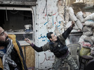 To date, Syrian rebels have had to rely on small-scale weapons in their fight against the Syrian army. Here, a rebel fighter throws an explosive device toward a Syrian government position in the northern city of Aleppo last month. To date, Syrian rebels have had to rely on small-scale weapons in their fight against the Syrian army. Here, a rebel fighter throws an explosive device toward a Syrian government position in the northern city of Aleppo last month.