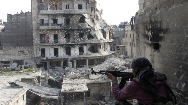 The Syrian military fired Scud missiles on rebel positions in northern Syria this week, a Pentagon source says. Here, a rebel fighter takes a position last month in the northern city of Aleppo, the scene of heavy fighting in recent months.