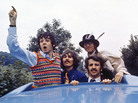 The Beatles look out of the Magical Mystery Tour coach skylight, on location in England in September 1967. The Beatles look out of the Magical Mystery Tour coach skylight, on location in England in September 1967.