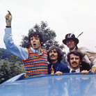 The Beatles look out of the Magical Mystery Tour coach skylight, on location in England in September 1967.