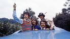 The Beatles look out of the Magical Mystery Tour coach skylight, on location in England in September 1967. The Beatles look out of the Magical Mystery Tour coach skylight, on location in England in September 1967.