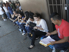 A crowd seeks help applying for the Deferred Action for Childhood Arrivals program at the Coalition for Humane Immigrant Rights of Los Angeles in August. Schools have been inundated with requests for the documents needed to qualify. A crowd seeks help applying for the Deferred Action for Childhood Arrivals program at the Coalition for Humane Immigrant Rights of Los Angeles in August. Schools have been inundated with requests for the documents needed to qualify.