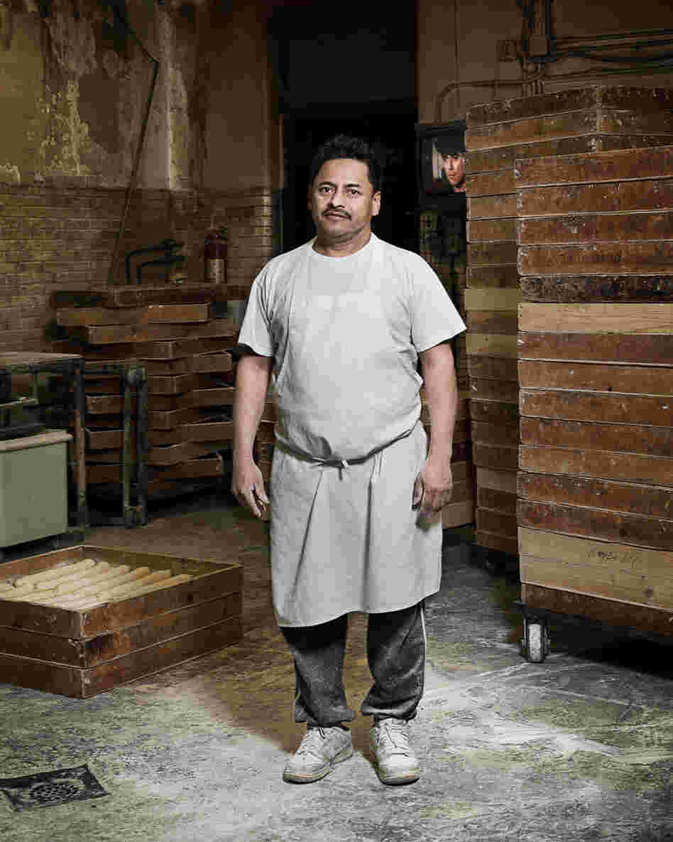 Adan, assistant baker at Antique Bakery