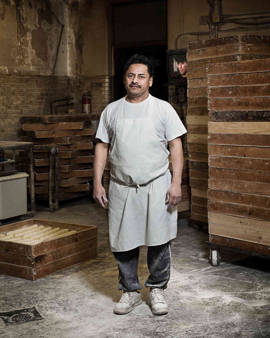 Adan, assistant baker at Antique Bakery