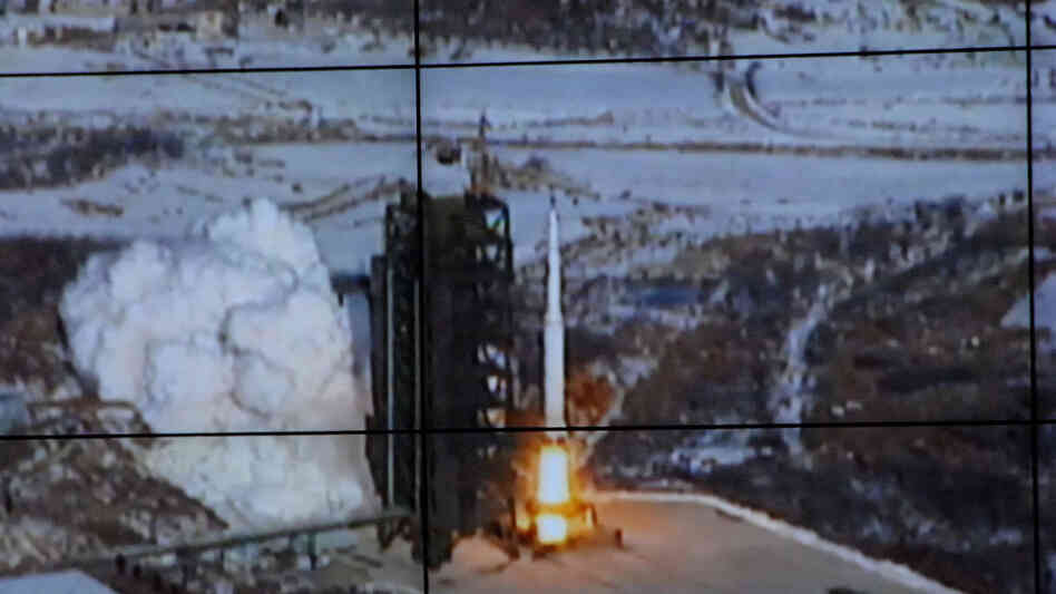 This image from North Korea's official Korean Central News Agency shows the long-range rocket Unha-3 as seen at a satellite control center prior to Wednesday's successful launch. This image from North Korea's official Korean Central News Agency shows the long-range rocket Unha-3 as seen at a satellite control center prior to Wednesday's successful launch.