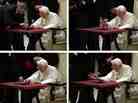 In these images, Pope Benedict XVI pushes the button, with help, to issue the first tweet on his personal account.