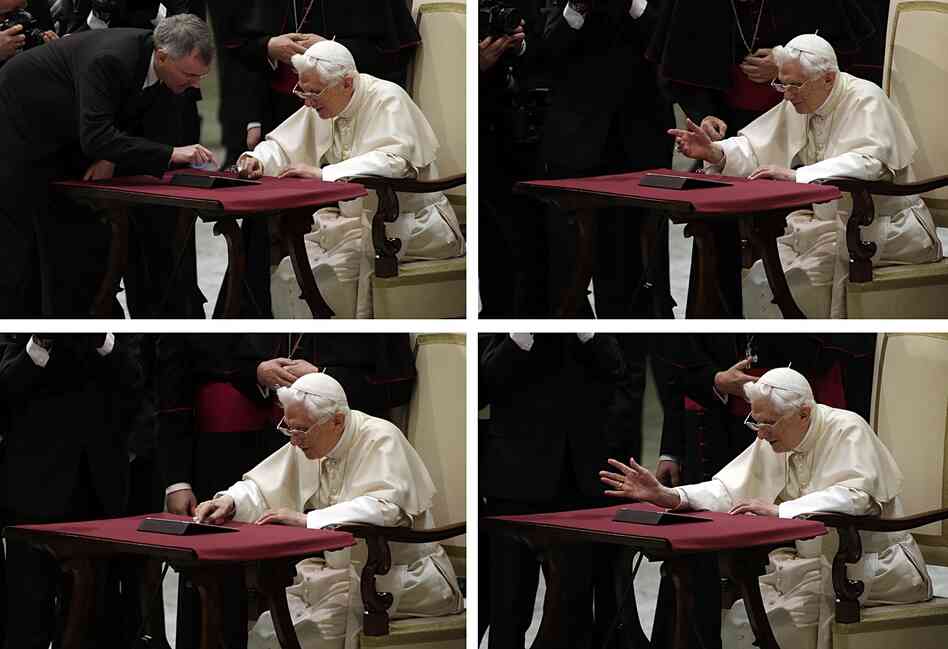 In these images, Pope Benedict XVI pushes the button, with help, to issue the first tweet on his personal account.