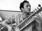 Ravi Shankar playing the sitar in May 1966. Ravi Shankar playing the sitar in May 1966.