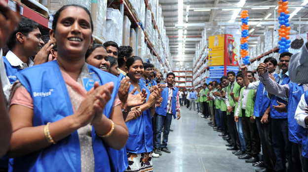 September 2012: Employees celebrate the opening of a Best Price Modern store in Hyderabad, India. Bharti Enterprises manages that and other such stores, which Wal-Mart has invested in.