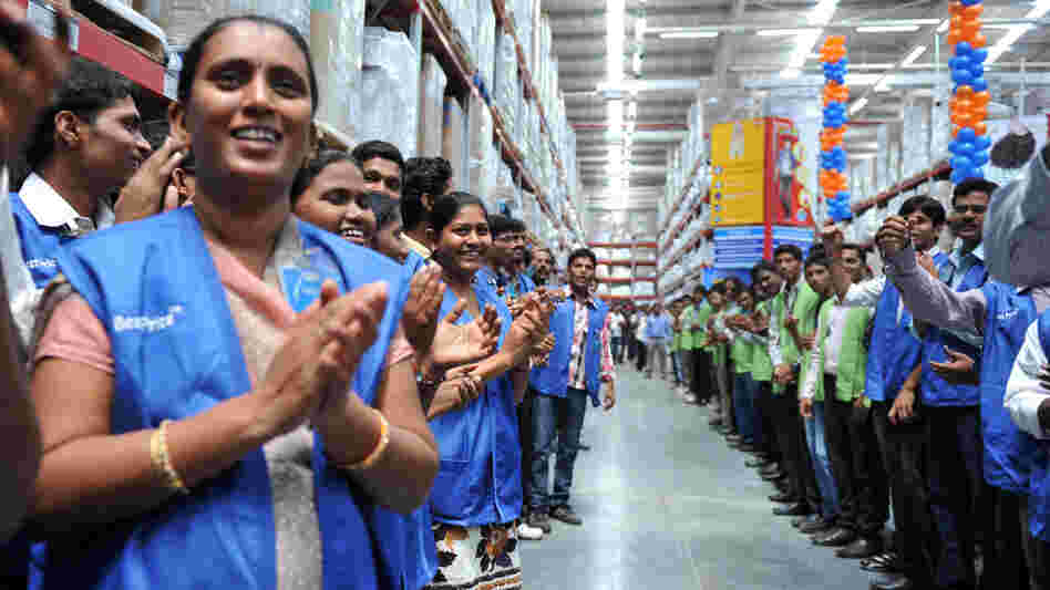 September 2012: Employees celebrate the opening of a Best Price Modern store in Hyderabad, India. Bharti Enterprises manages that and other such stores, which Wal-Mart has invested in. September 2012: Employees celebrate the opening of a Best Price Modern store in Hyderabad, India. Bharti Enterprises manages that and other such stores, which Wal-Mart has invested in.