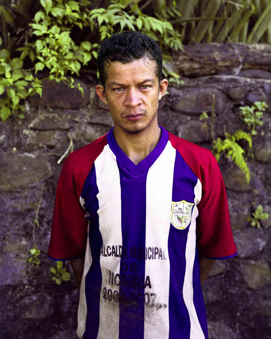 Israel, born shortly after repatriation in Valle Nuevo, works in the greenhouses.