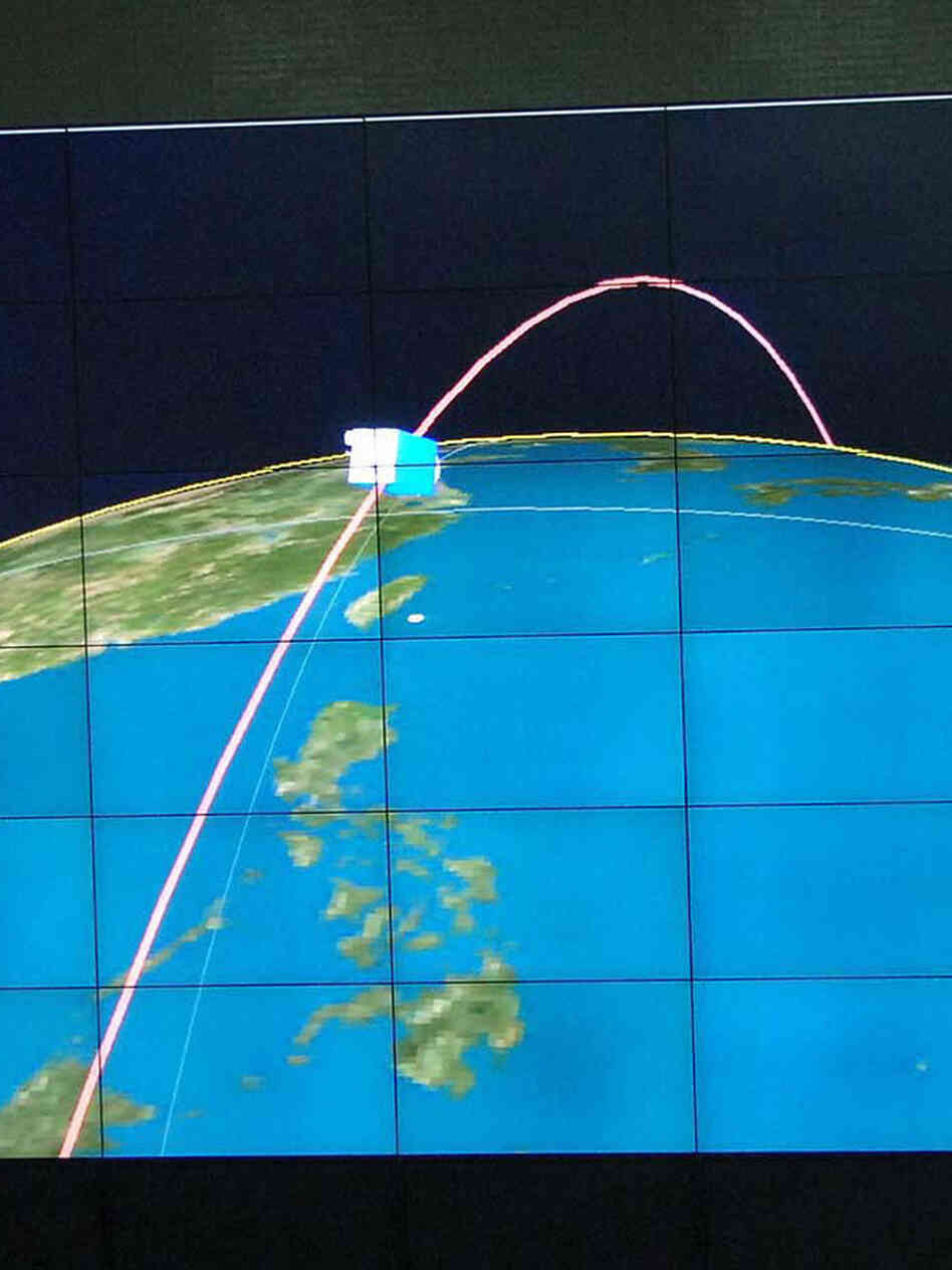 This picture received from North Korea's official Korean Central News Agency on Wednesday shows an orbit image of the satellite Kwangmyongsong-3, being monitored on a large screen at a satellite control center in Cholsan county, North Pyongan province in North Korea.