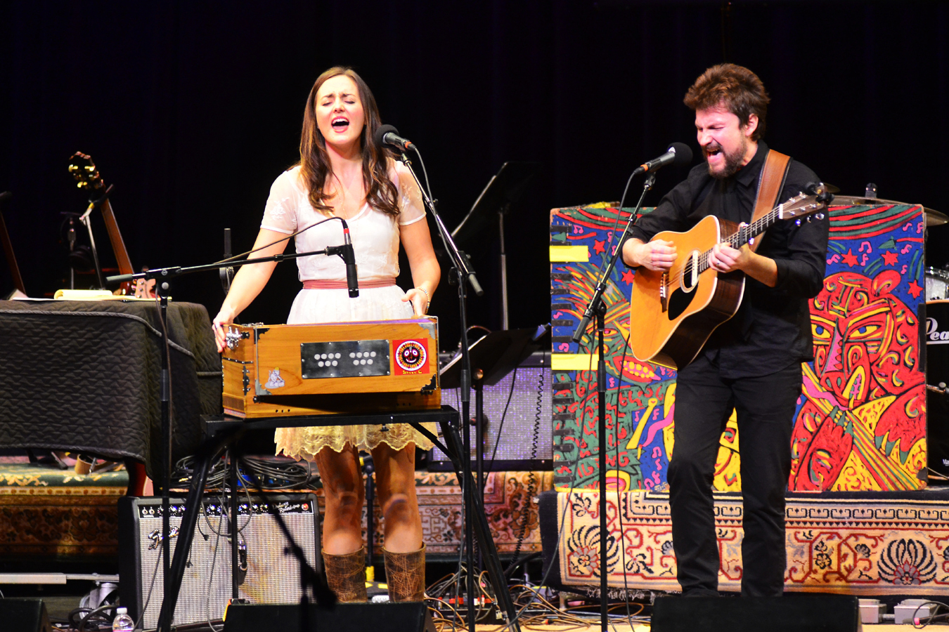 The duo plays a wide range of instruments, including harmonium, banjo and thumb piano.