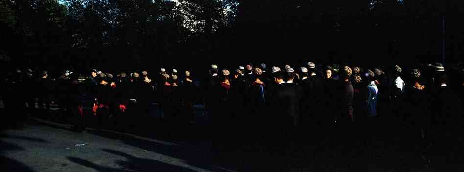 Turkmenistanis line up during the ceremony for the anniversary of the 1948 Ashgabat earthquake, which killed more than 100,000 residents in the capital of Turkmenistan, October 2012.