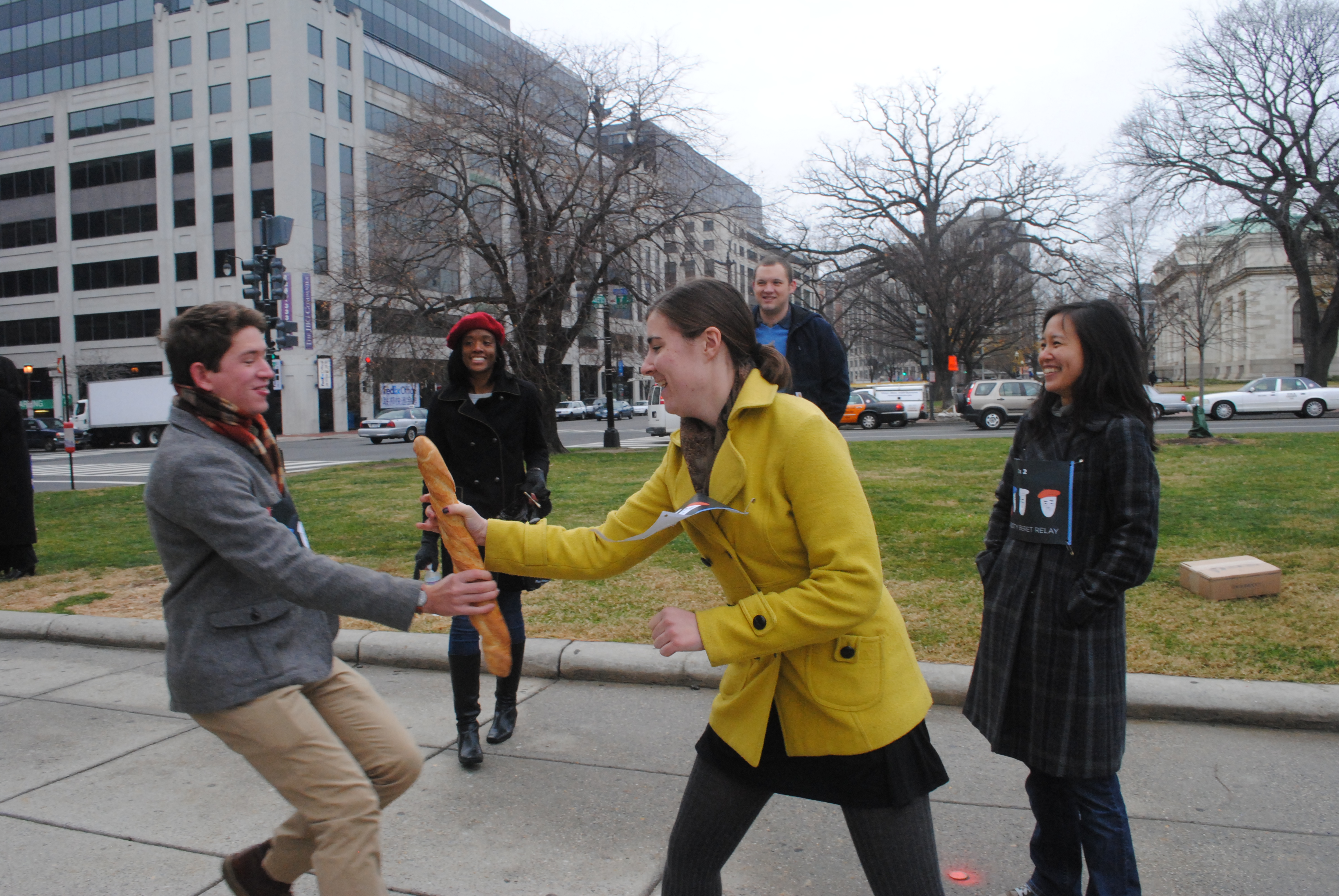 Bard hands off the baguette baton to teammate Emma Roller, an intern on the Washington Desk.
