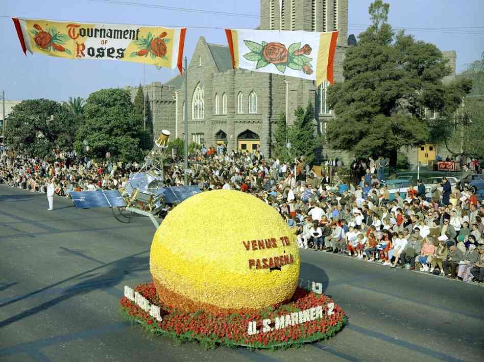 A model of JPL's Mariner 2 spacecraft above a floral "Venus" moved down Colorado Boulevard in Pasadena, Calif., in the 1963 Tournament of Roses Parade on Jan. 1. A model of JPL's Mariner 2 spacecraft above a floral "Venus" moved down Colorado Boulevard in Pasadena, Calif., in the 1963 Tournament of Roses Parade on Jan. 1.