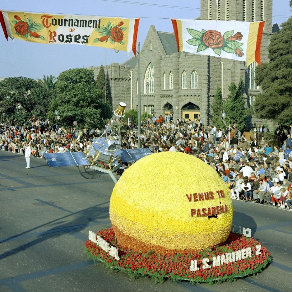 A model of JPL's Mariner 2 spacecraft above a floral "Venus" moved down Colorado Boulevard in Pasadena, Calif., in the 1963 Tournament of Roses Parade on Jan. 1.
