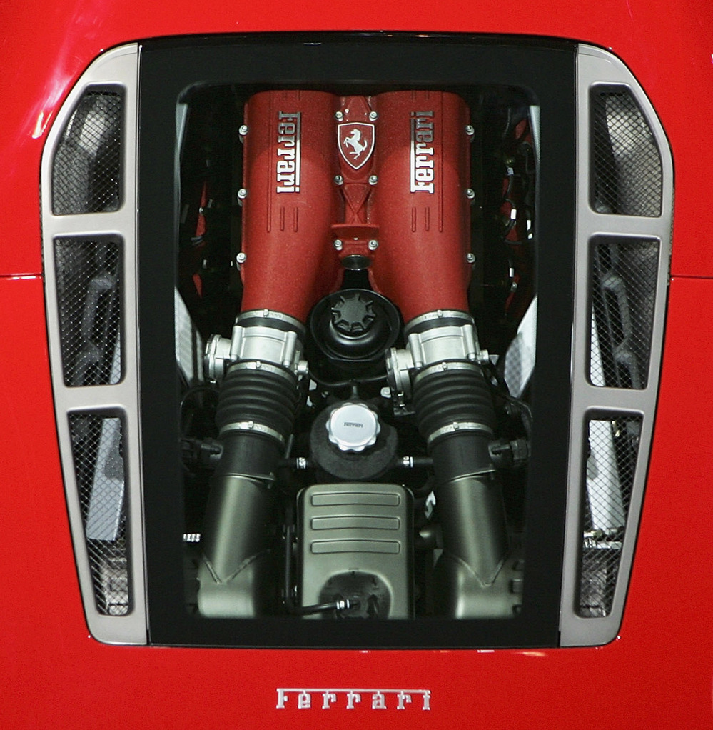 A car cannot be reduced to an engine, just as a person cannot be reduced to a brain.