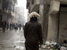 A Syrian woman carries a ration of bread on her head in the northern city of Aleppo. The Syrian opposition now runs local councils in many cities, particularly in the north. They often face major challenges in providing basics likes food, water and electricity. A Syrian woman carries a ration of bread on her head in the northern city of Aleppo. The Syrian opposition now runs local councils in many cities, particularly in the north. They often face major challenges in providing basics likes food, water and electricity.