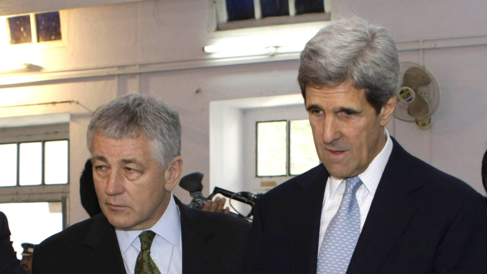 Then-Sen. Chuck Hagel, R-Neb., and Sen. John Kerry, D-Mass., observe voting in parliamentary elections in Lahore, Pakistan, in 2008. President Obama is reportedly considering Hagel as his next defense secretary, and Kerry for secretary of state.