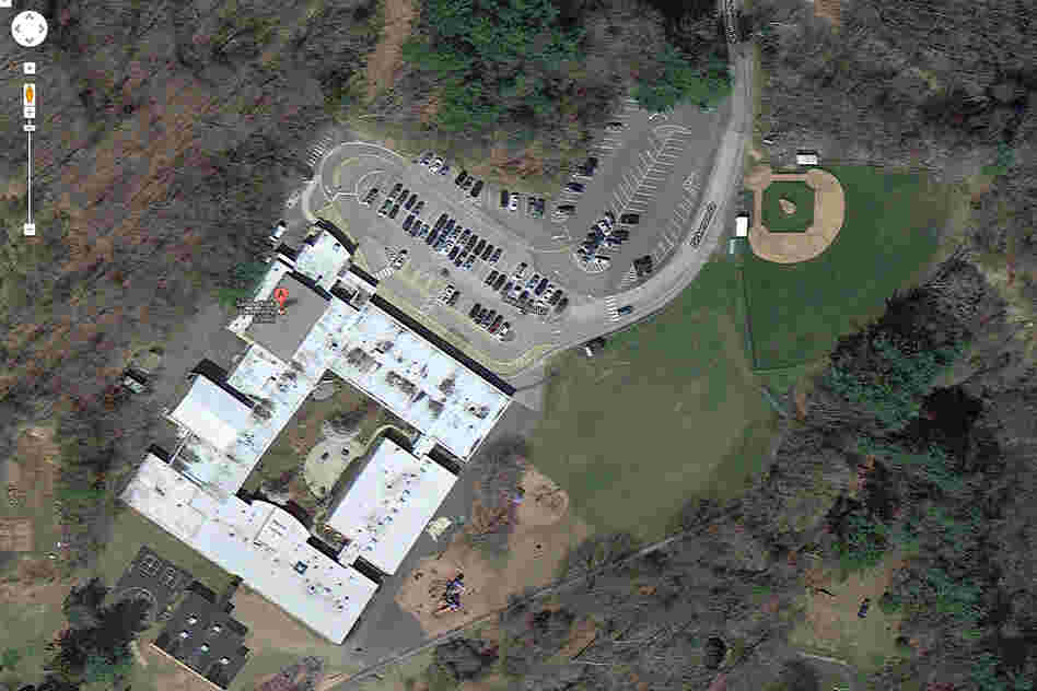 This satellite image provided by Google shows an aerial view of Sandy Hook Elementary School.