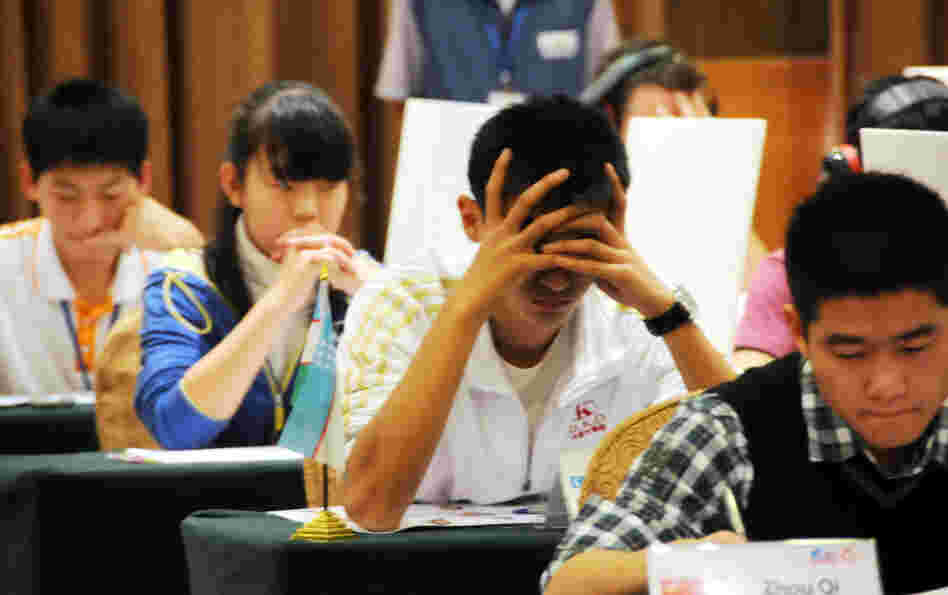 Argh, it's on the tip of my tongue! Contestants in the Names and Faces competition focus at last year's World Memory Championships held in Guangzhou, China. A new field of mental athletes is currently vying for the 2012 championship.