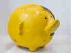 Thomas Lamb's "Adolph the Pig." The message scribbled on top reads "Save for Victory and Make Him Squeal."