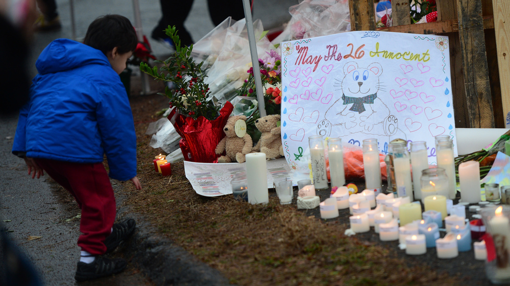 A makeshift shrine honors the victims of a elementary school shooting that happened Friday in Newtown, Conn. A makeshift shrine honors the victims of a elementary school shooting that happened Friday in Newtown, Conn.