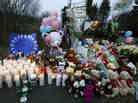 A makeshift memorial was set up near the entrance to the Sandy Hook Elementary School on Sunday.
