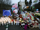 A makeshift memorial was set up near the entrance to the Sandy Hook Elementary School on Sunday. A makeshift memorial was set up near the entrance to the Sandy Hook Elementary School on Sunday.