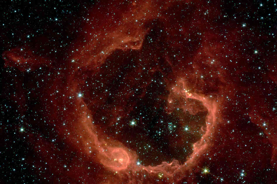 "This bubble of ionized gas and warm dust, called RCW 79, lies in the southern Milky Way. ... [NASA's telescopes] have found at least three generations of stars forming in this expanding envelope."