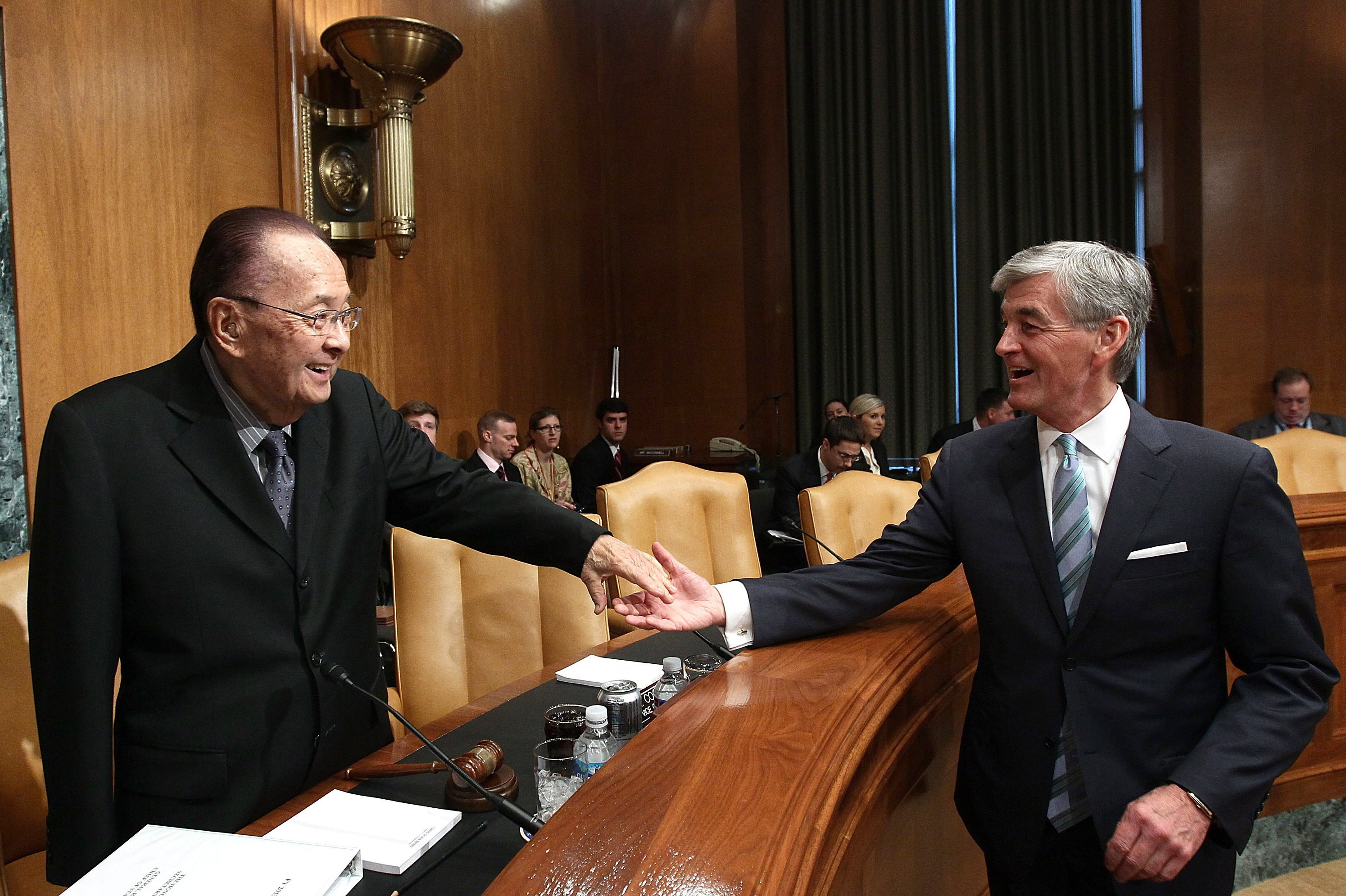 Secretary of the Army John McHugh greets Inouye before a hearing of the Senate Appropriations Committee March 21 in Washington, D.C.
