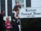 Mourners leave the Honan funeral home after attending the funeral of Jack Pinto, 6, one of the victims of the Sandy Hook Elementary School shootings, in Newtown, Conn. Mourners leave the Honan funeral home after attending the funeral of Jack Pinto, 6, one of the victims of the Sandy Hook Elementary School shootings, in Newtown, Conn.