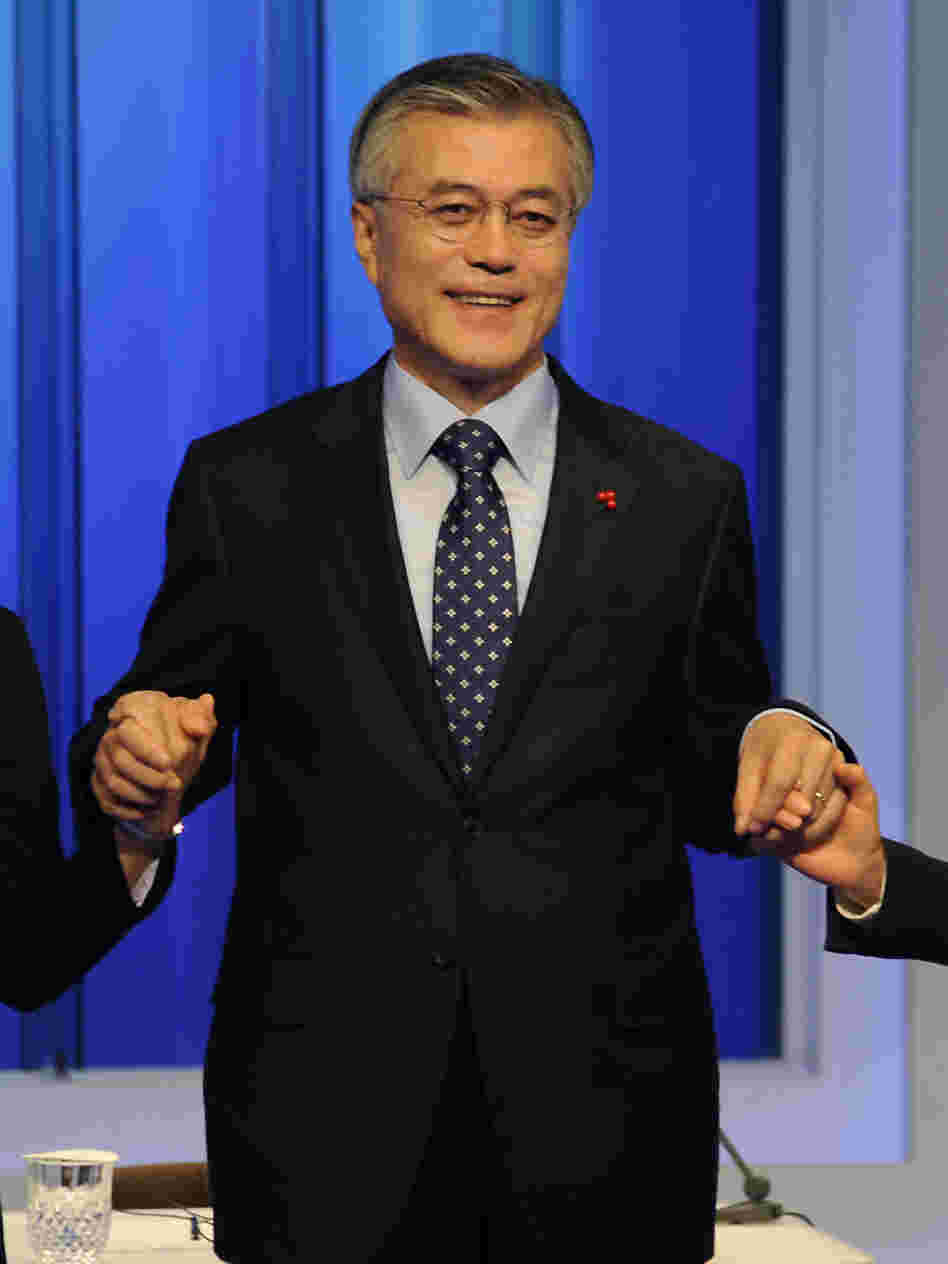 Moon Jae-in, a former human rights lawyer, is also a leading candidate in Wednesday's election. A former presidential chief of staff, he's shown here at a presidential debate on Dec. 4.