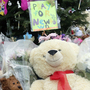 A mourner pays his respects at one of the makeshift memorials for the Sandy Hook elementary shooting on Monday in Newtown, Conn. A mourner pays his respects at one of the makeshift memorials for the Sandy Hook elementary shooting on Monday in Newtown, Conn.