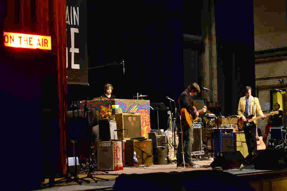 John Darnielle plays with bassist Peter Hughes and drummer Jon Wurster, with whom he's been recording and touring since 2007.