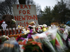 Flowers, candles and stuffed animals make up a makeshift memorial in Newtown, Conn., on Monday. Much of the initial news coverage of Friday's events was later found to be inaccurate. Flowers, candles and stuffed animals make up a makeshift memorial in Newtown, Conn., on Monday. Much of the initial news coverage of Friday's events was later found to be inaccurate.